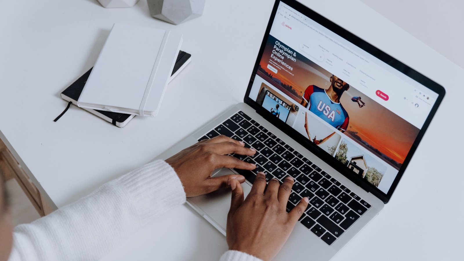 Laptop displaying a website homepage, representing common website design mistakes